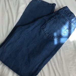 Dark blue distressed jeans
